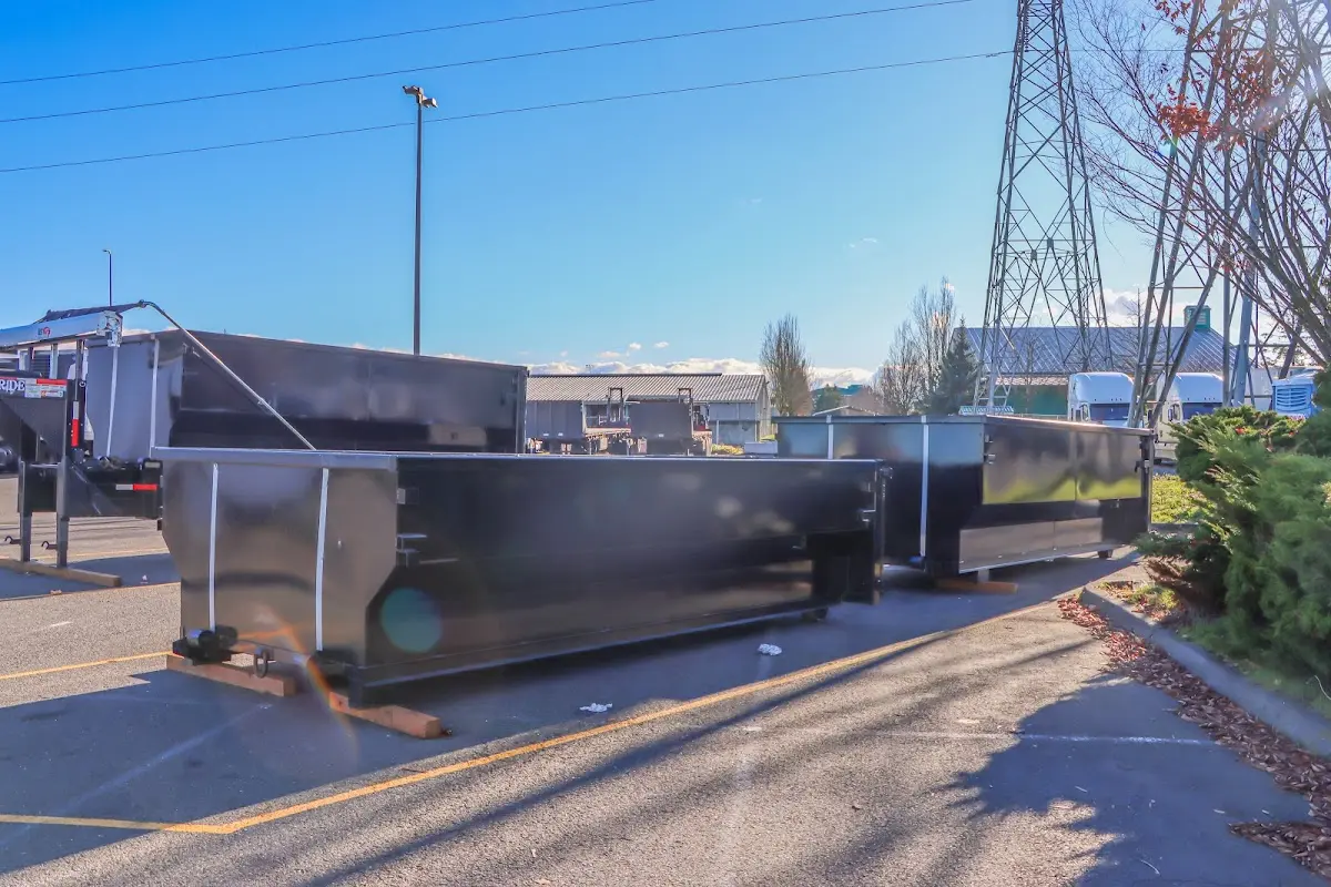 Roll-off dumpster ready for waste disposal at job site for Concrete Dumpster Rental in Conewago